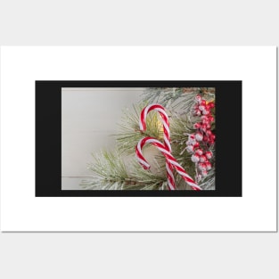 Bright Christmas or New Year wooden background with fir branches, Christmas decorations. Christmas sweets. Copy space. View from above Posters and Art